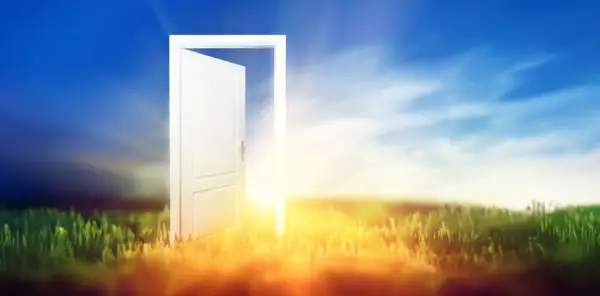 Open door to new beginnings symbolizing mental health transformation through Triumph Steps coaching in Miami FL.