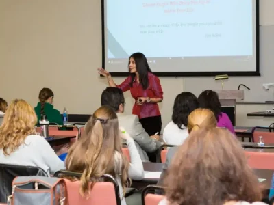 Beatriz Martinez-Peñalver conducting Triumph Steps mental health workshop training session in Miami classroom.